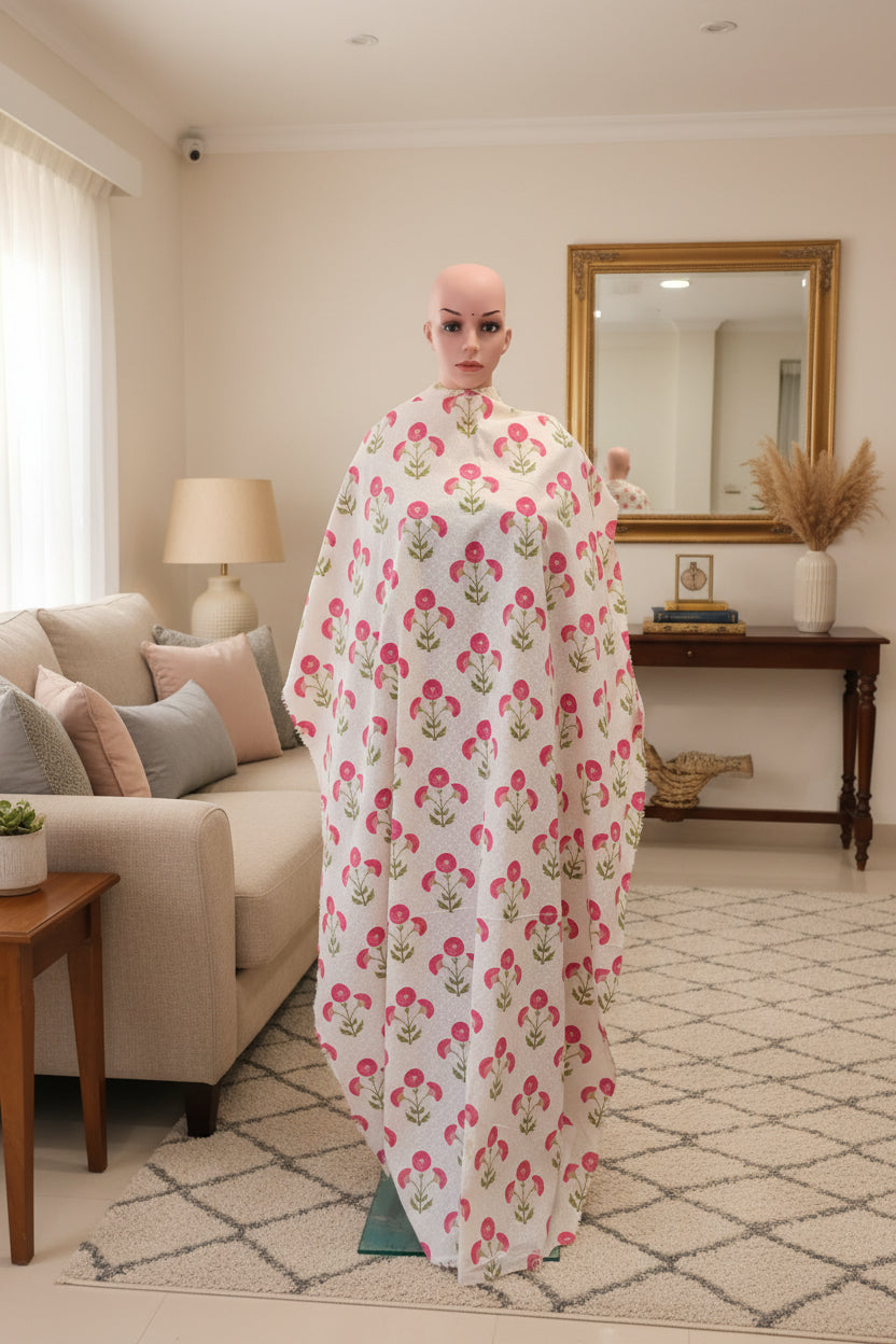 Cream cotton flex fabric with pink and green floral print.