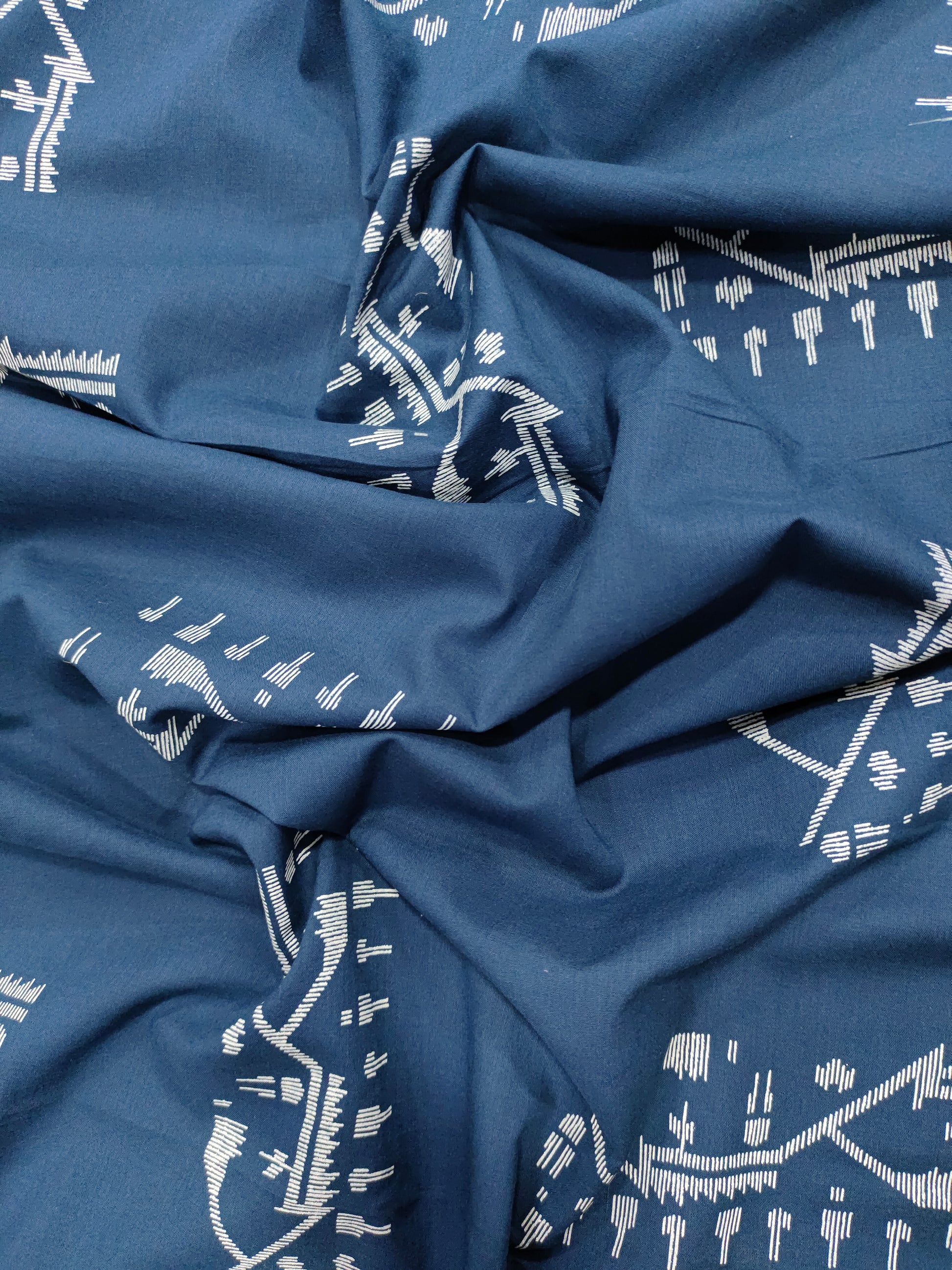 Navy blue cotton fabric with jamdani type print with white