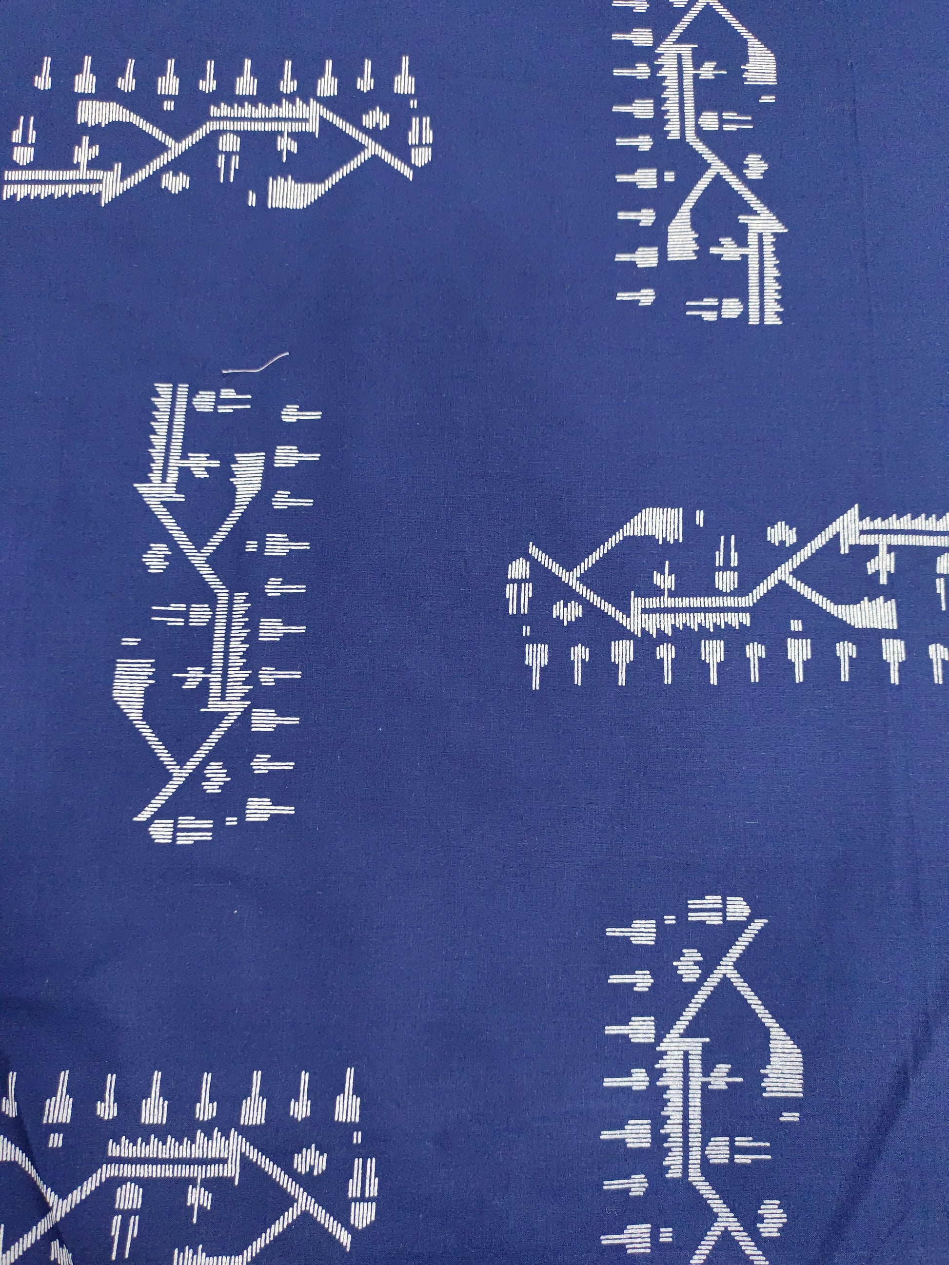 Ink blue cotton jamdani print fabric.