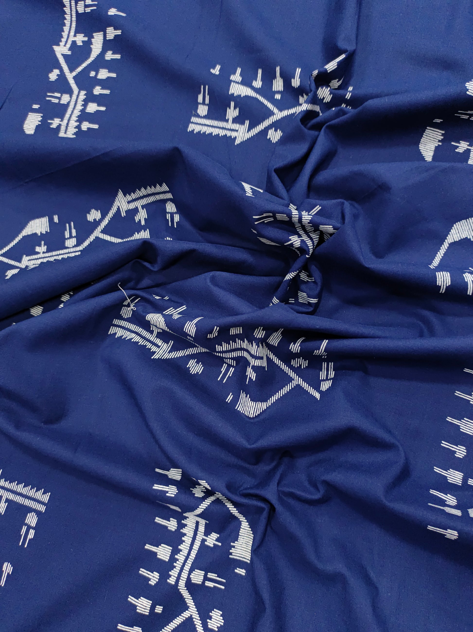 Ink blue cotton jamdani print fabric.