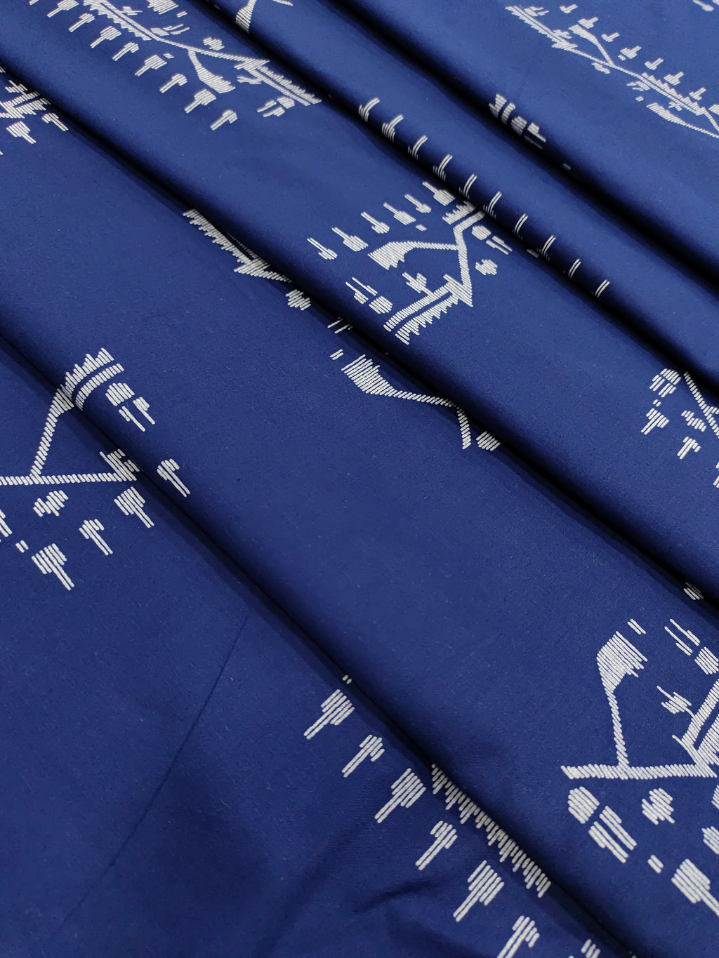 Ink blue cotton jamdani print fabric.