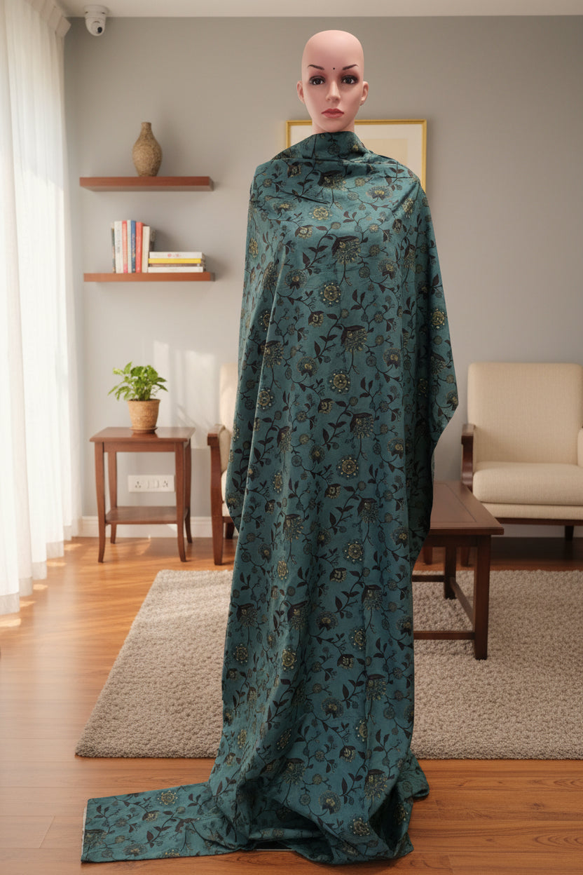 Cotton peacock green fabric jaal print with black maroon mustard.