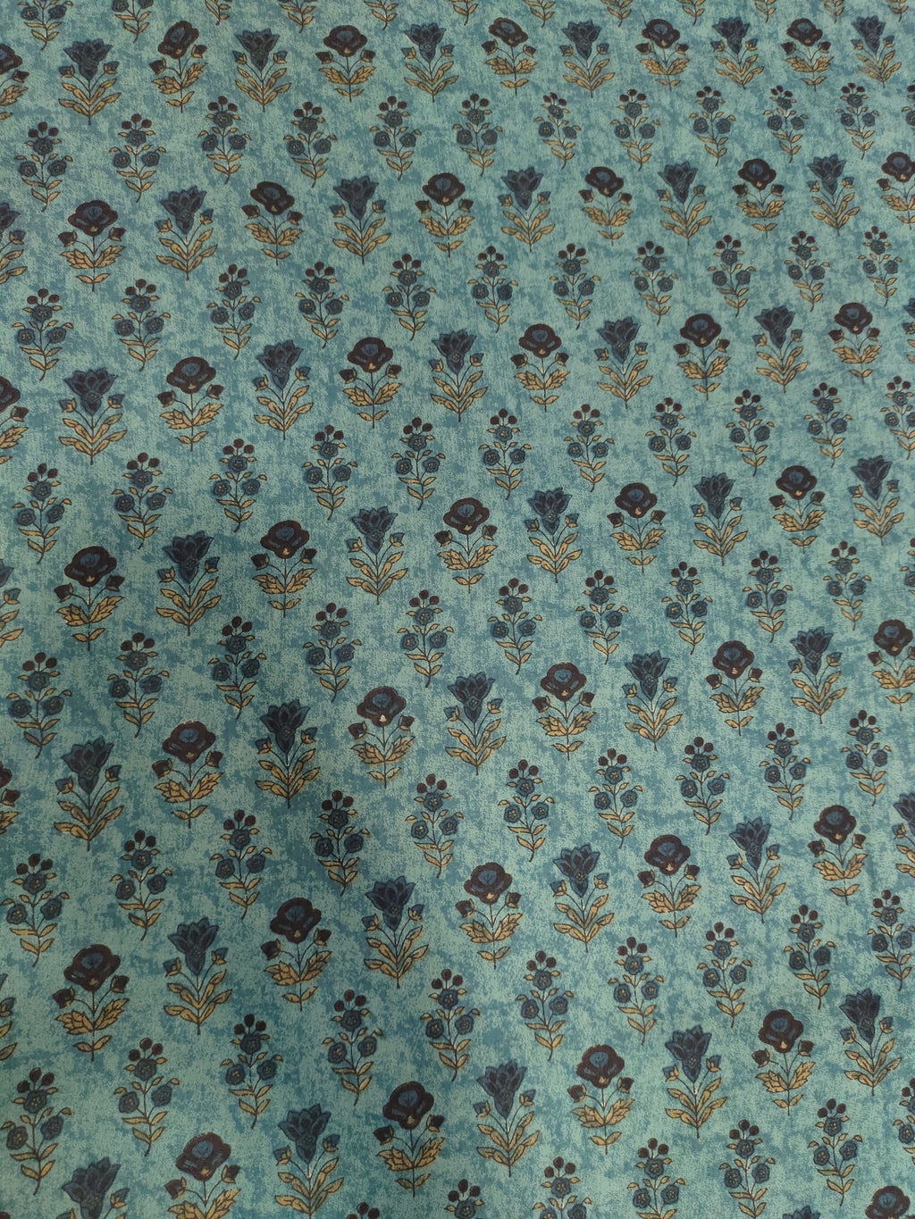 Cotton 60s bagh print butti on peacock green color.