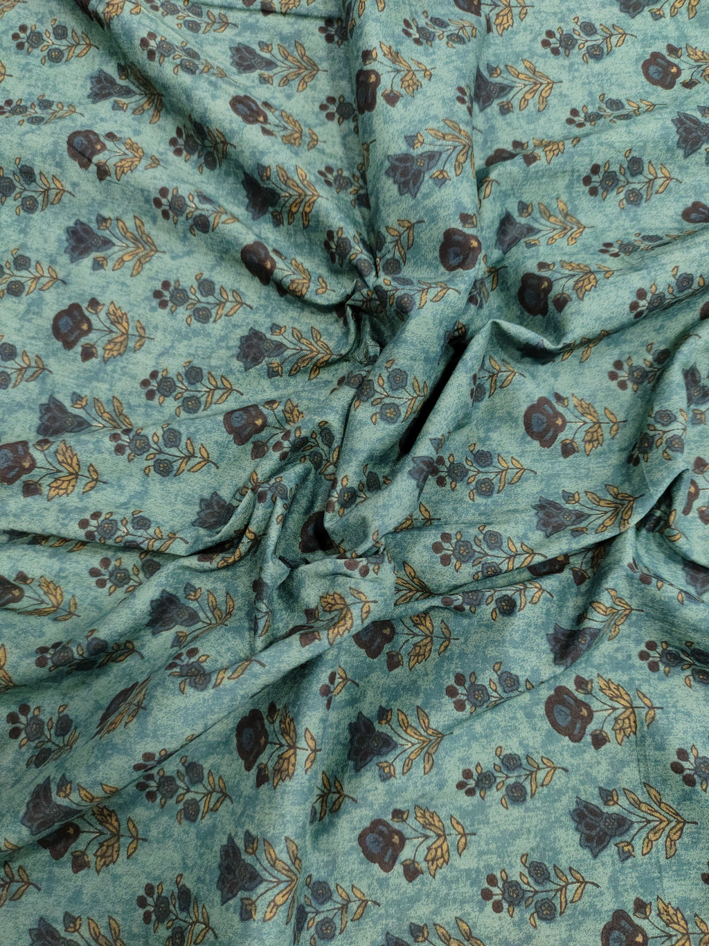Cotton 60s bagh print butti on peacock green color.