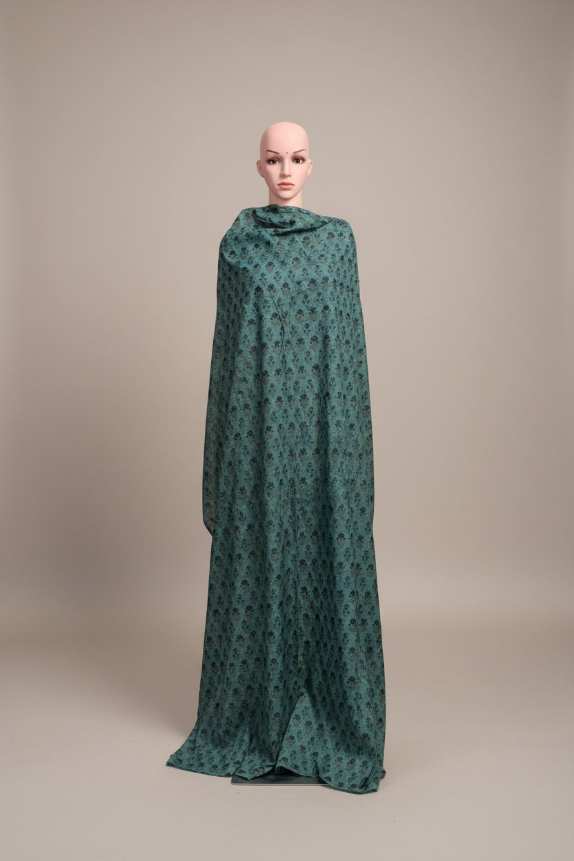 Cotton 60s bagh print butti on peacock green color.