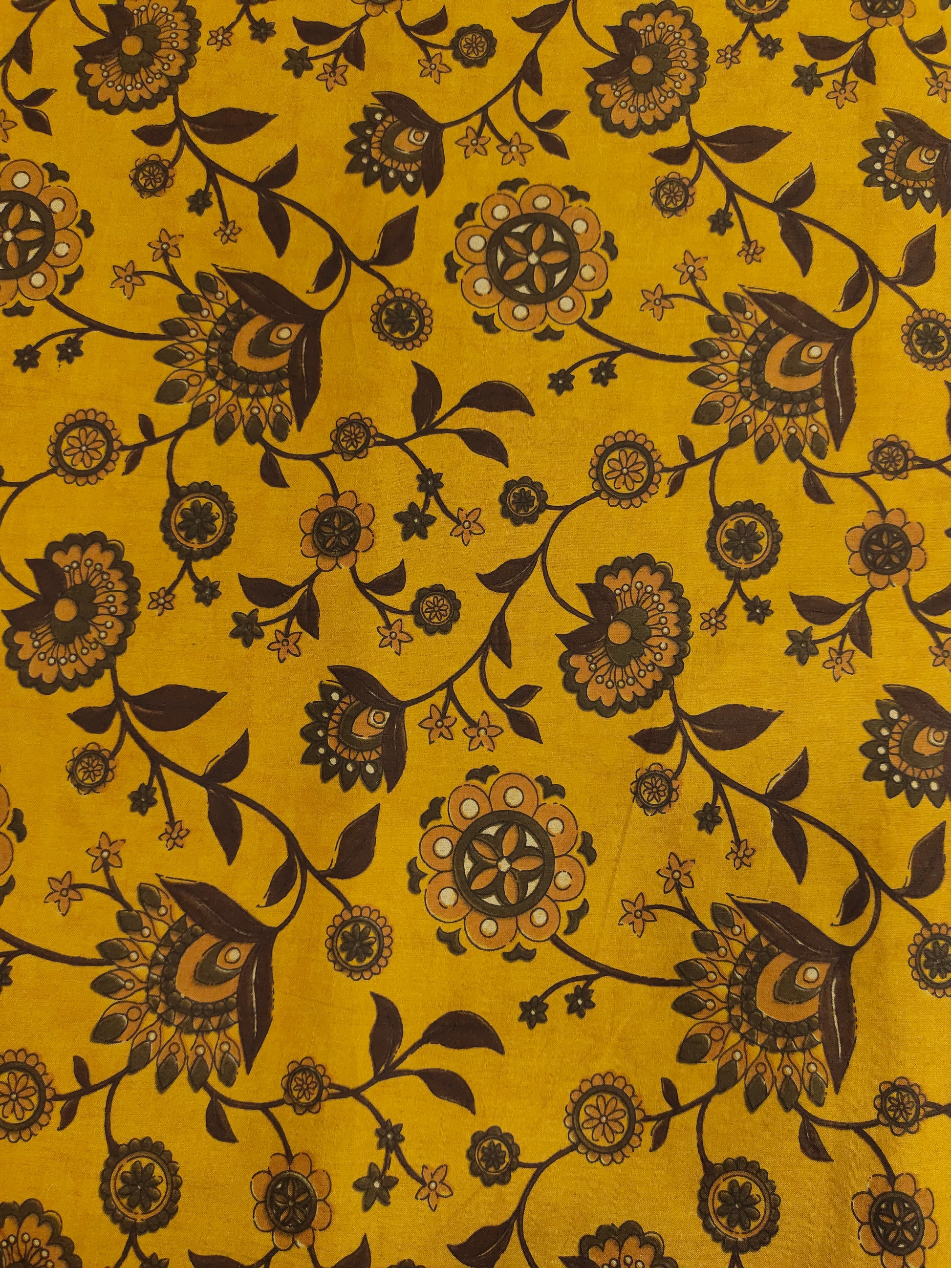 Mustard cotton bagh jaal print with coffee and rust colors.