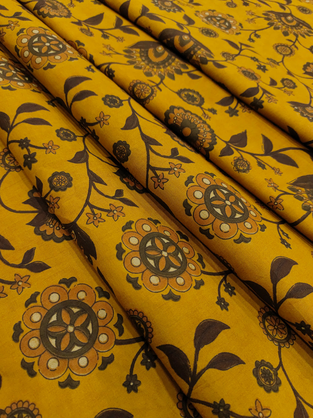 Mustard cotton bagh jaal print with coffee and rust colors.