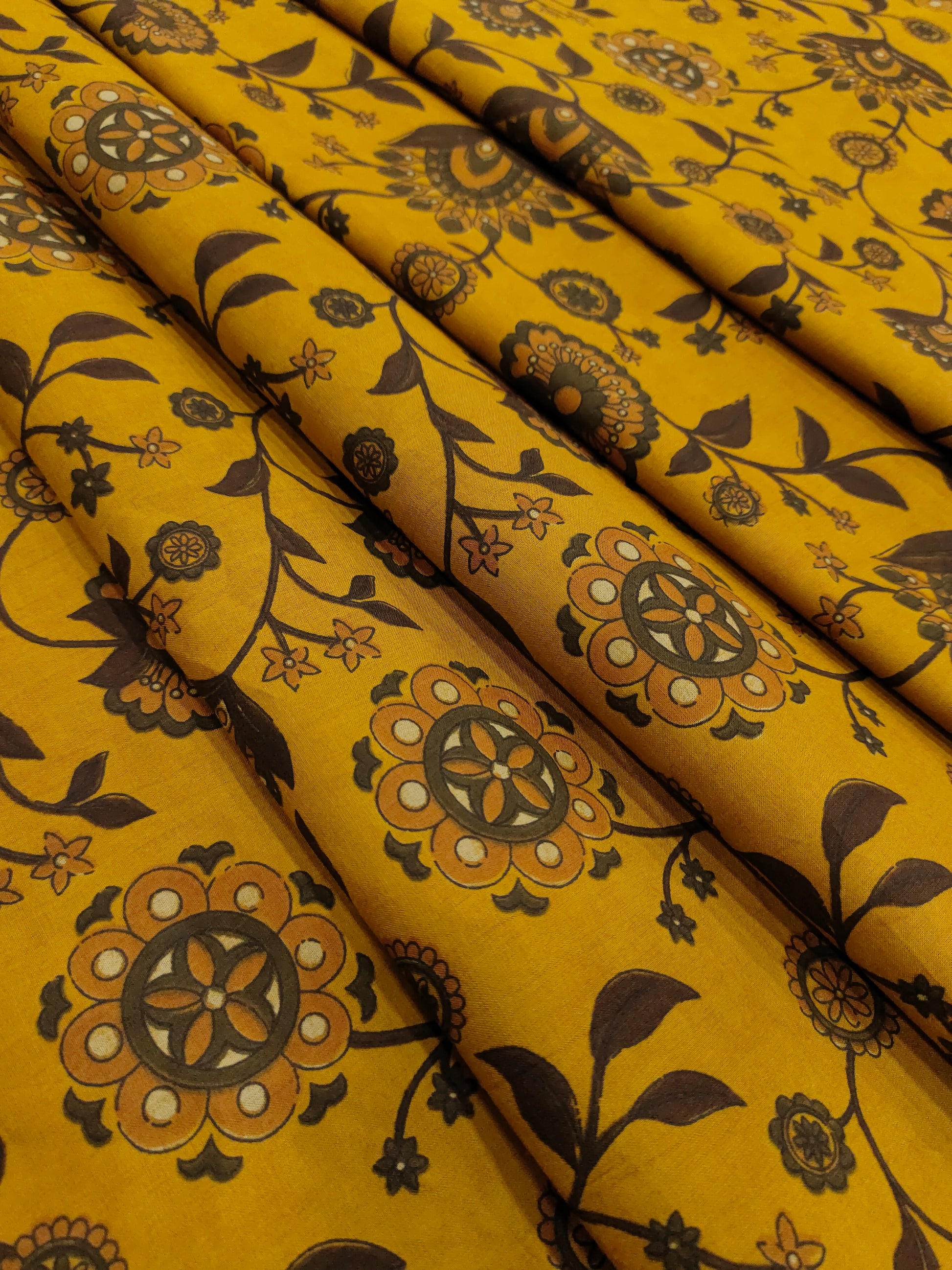 Mustard cotton bagh jaal print with coffee and rust colors.