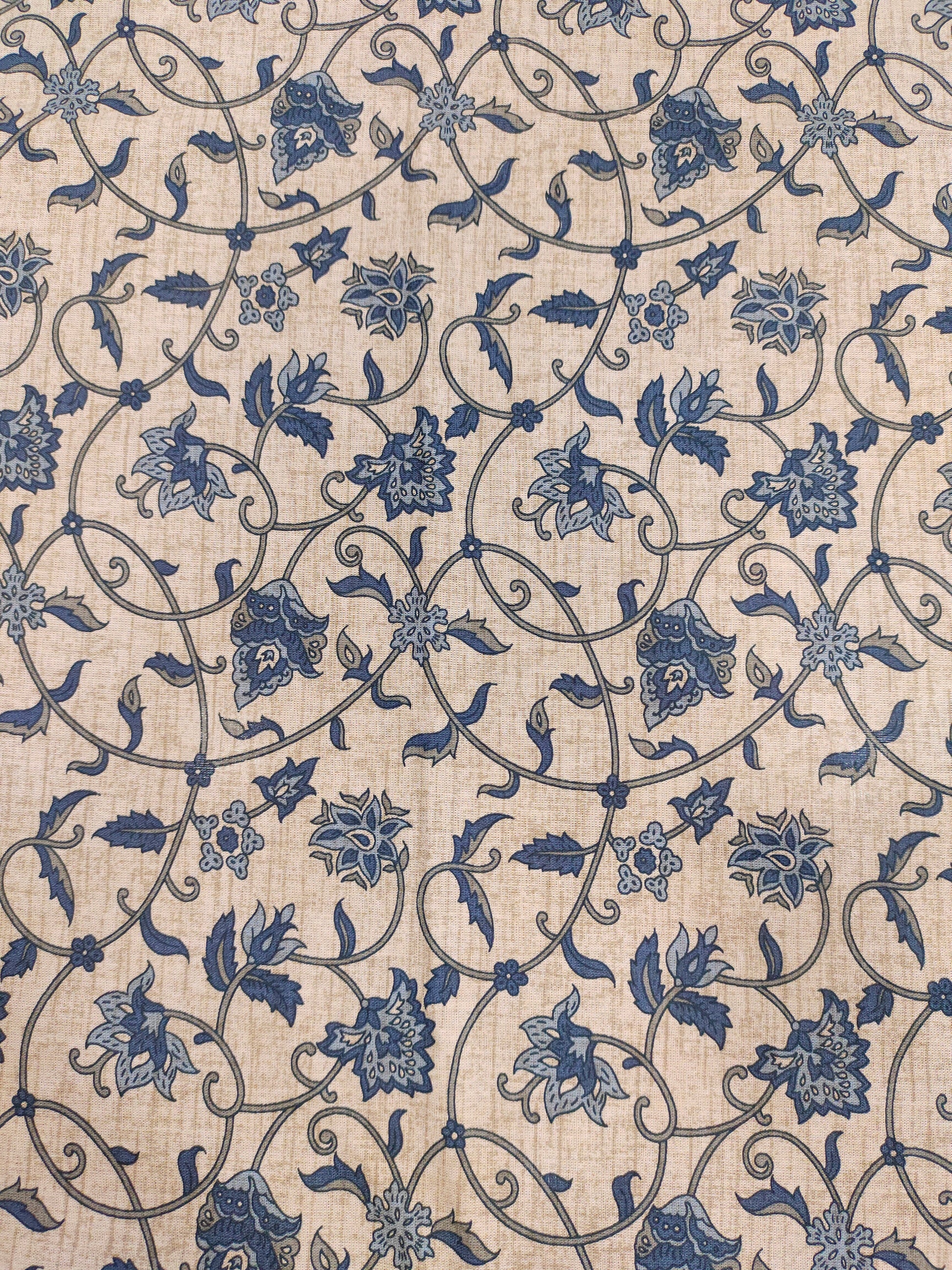 Cotton flex print on beige fabric with blue color jaal print.
