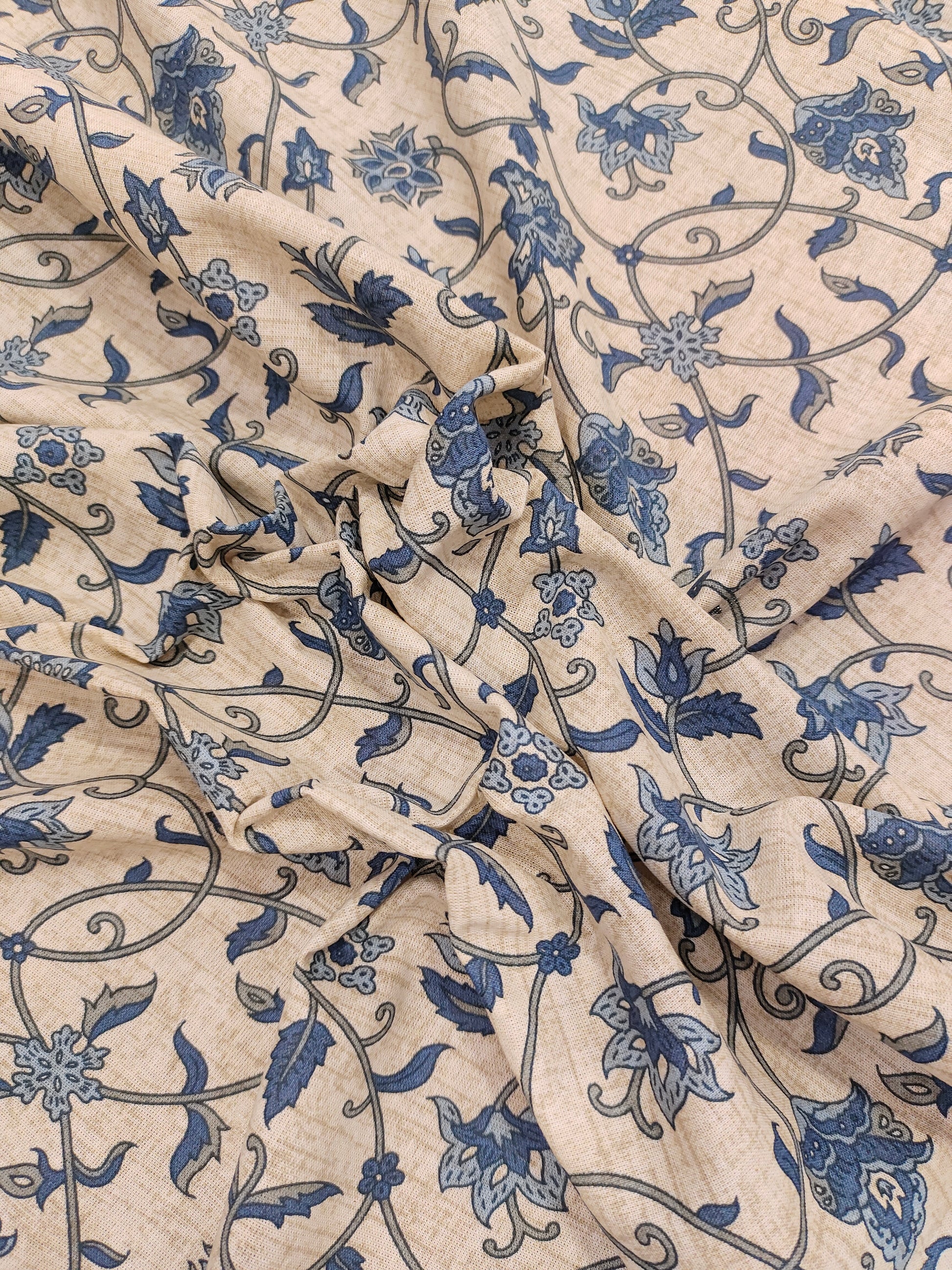 Cotton flex print on beige fabric with blue color jaal print.
