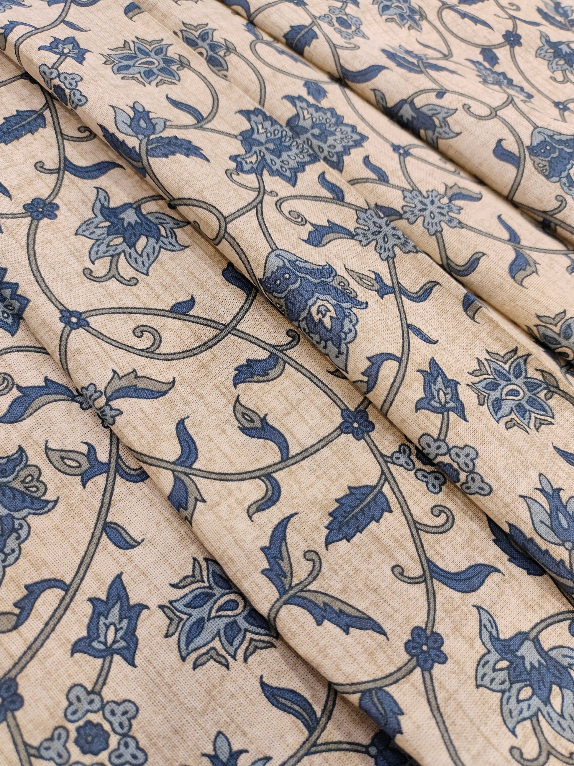 Cotton flex print on beige fabric with blue color jaal print.