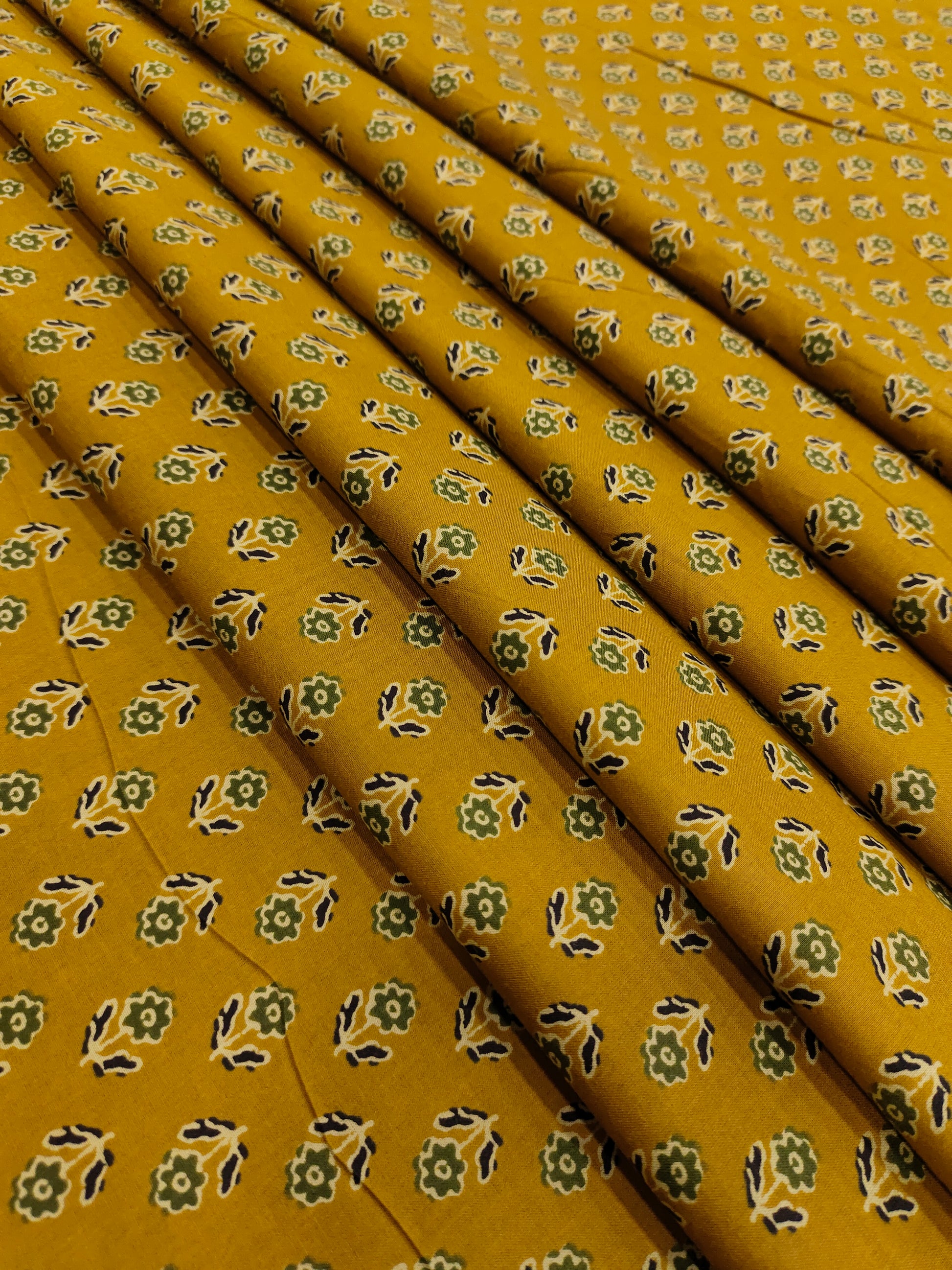 Mehendi color jaipur cotton screen print fabric small butti with green black and cream