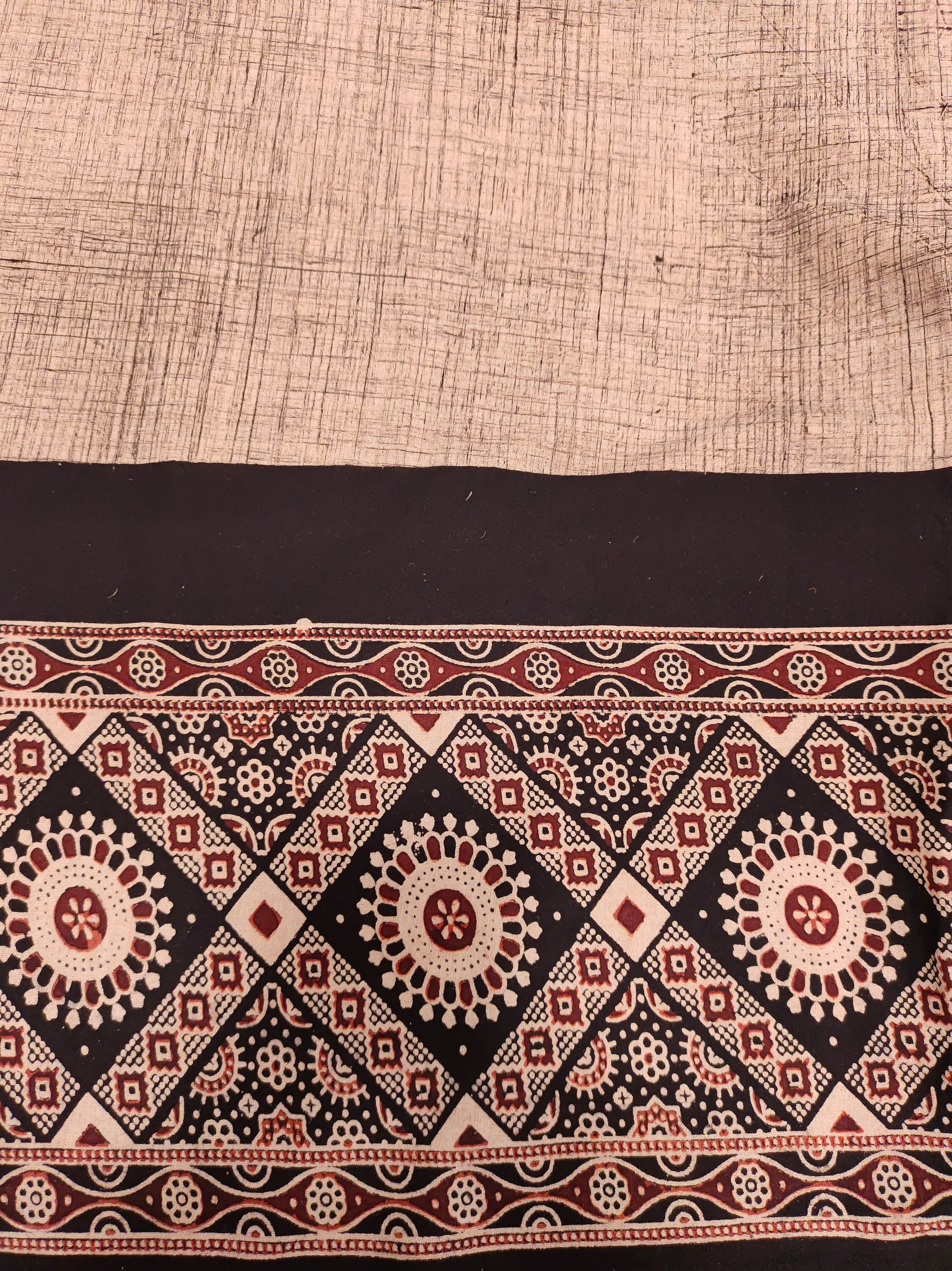 Beige Jaipur cotton daman fabric with ajrak print with maroon and black.