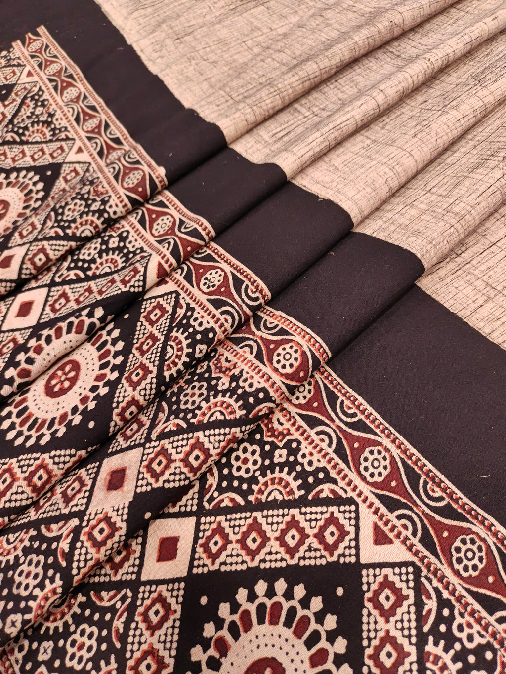 Beige Jaipur cotton daman fabric with ajrak print with maroon and black.