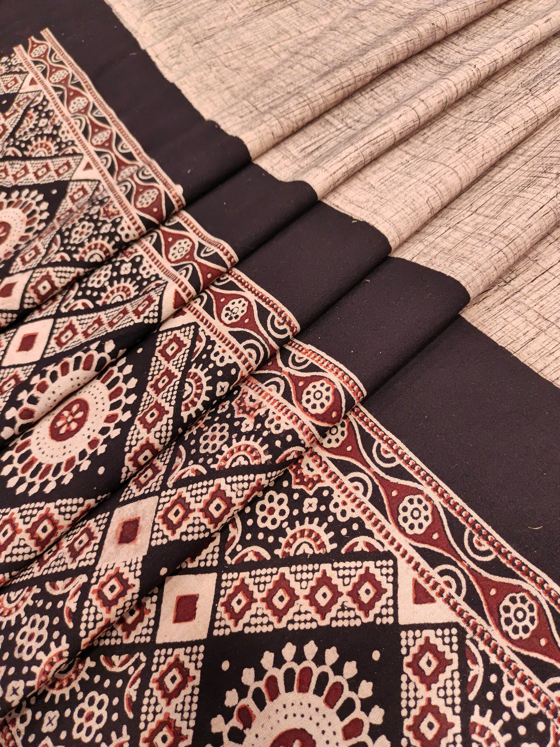 Beige Jaipur cotton daman fabric with ajrak print with maroon and black.