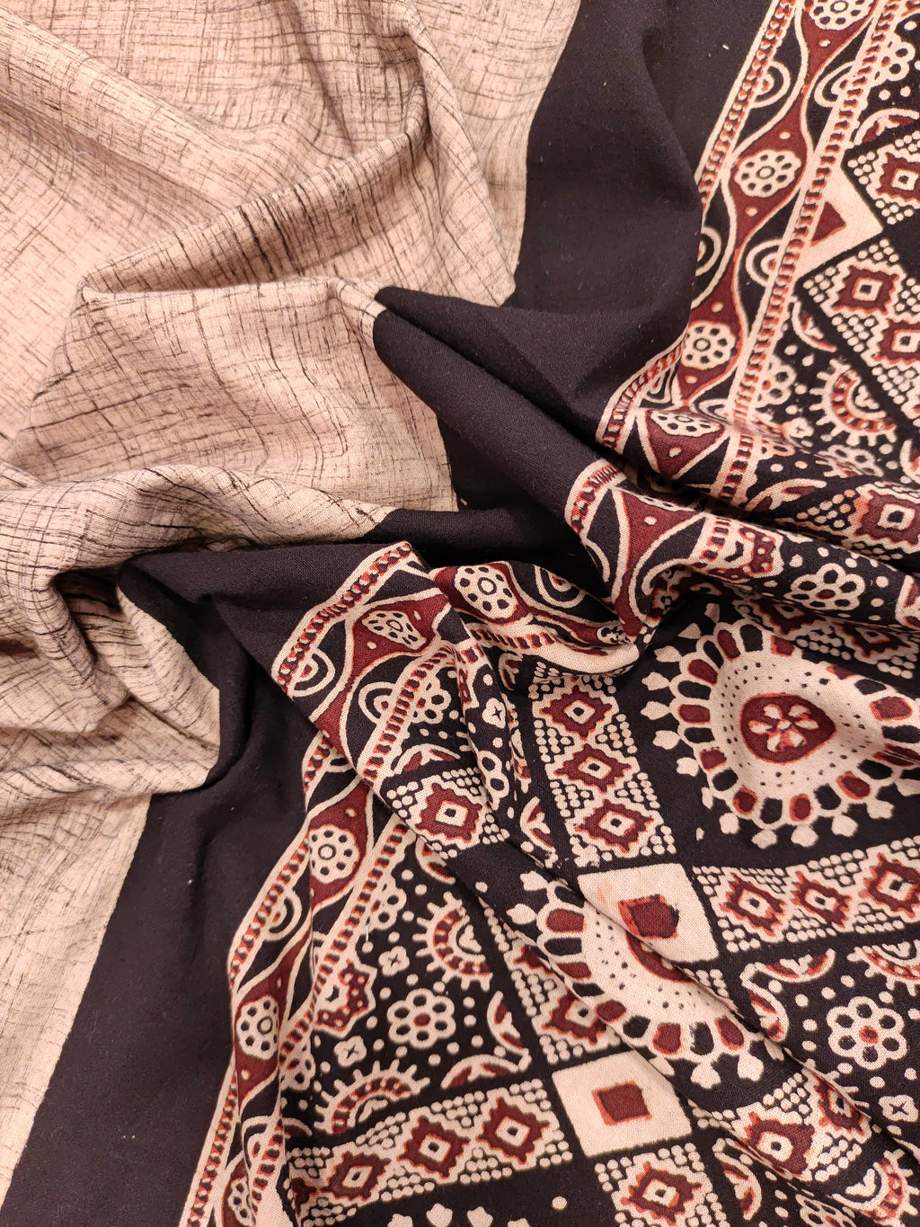 Beige Jaipur cotton daman fabric with ajrak print with maroon and black.