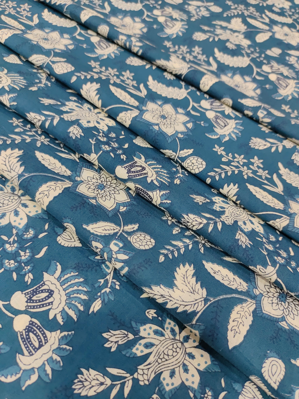 Cotton jaal print blue fabric with cream floral jaal