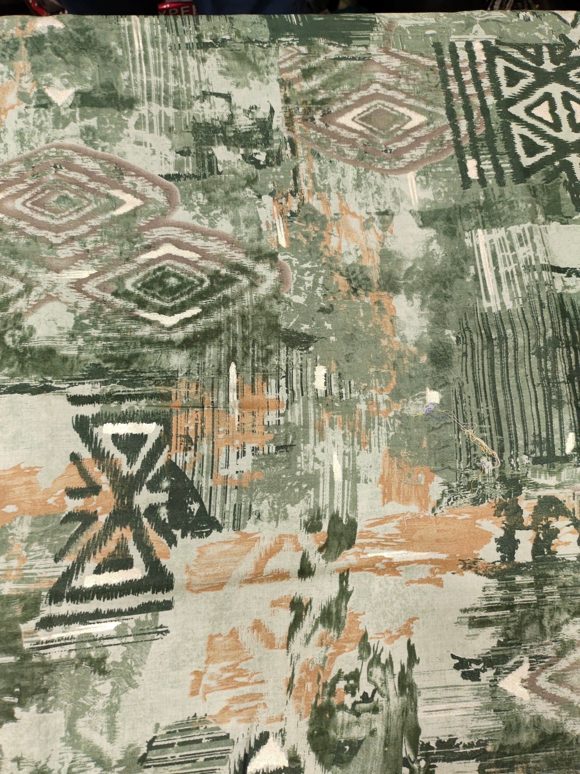Green cotton digital print with gold foile.